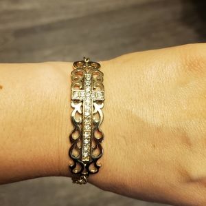 Jewel cross on gold pattern plate bracelet wtassel